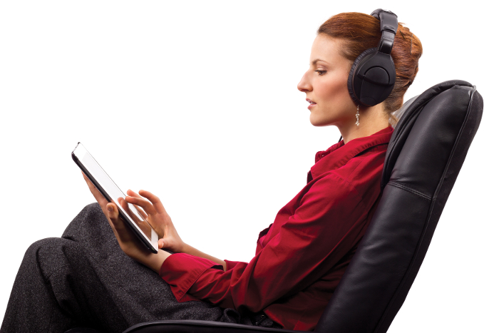 Woman listening to audio books on a tablet